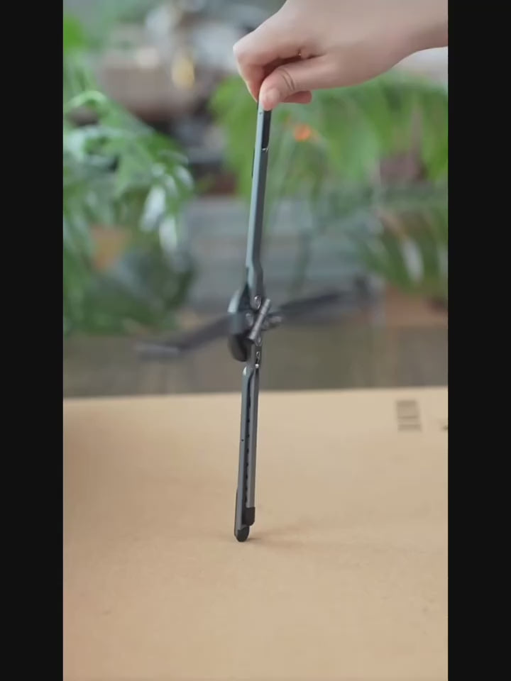 Vidéo du support pliable et réglable pour téléphone, tablette et ordinateur, avec rotations à 90° et 180° et dimensions compactes.